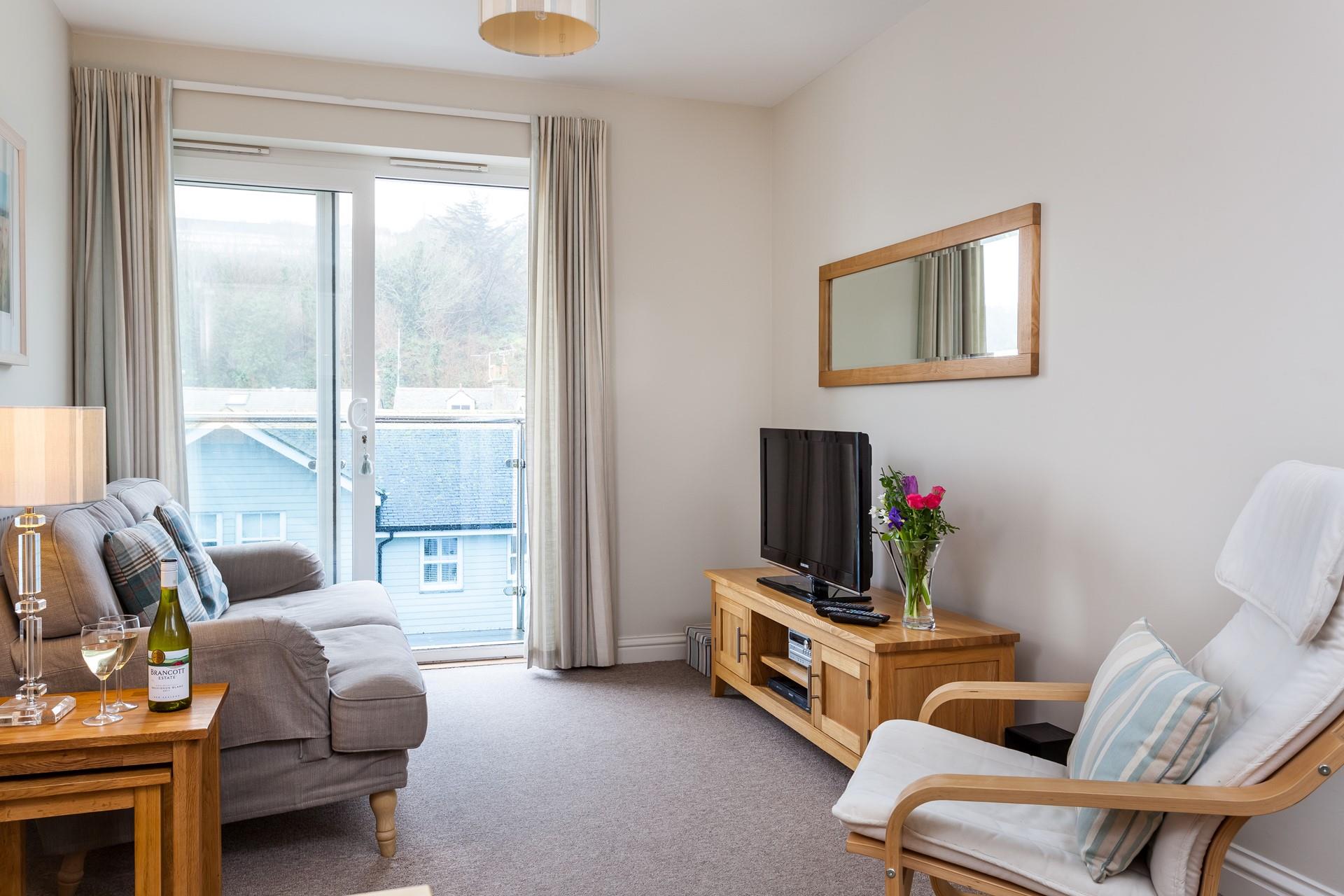 Relax in the plush and homely living area with a glass of something chilled whilst you watch the sunset over St Ives.
