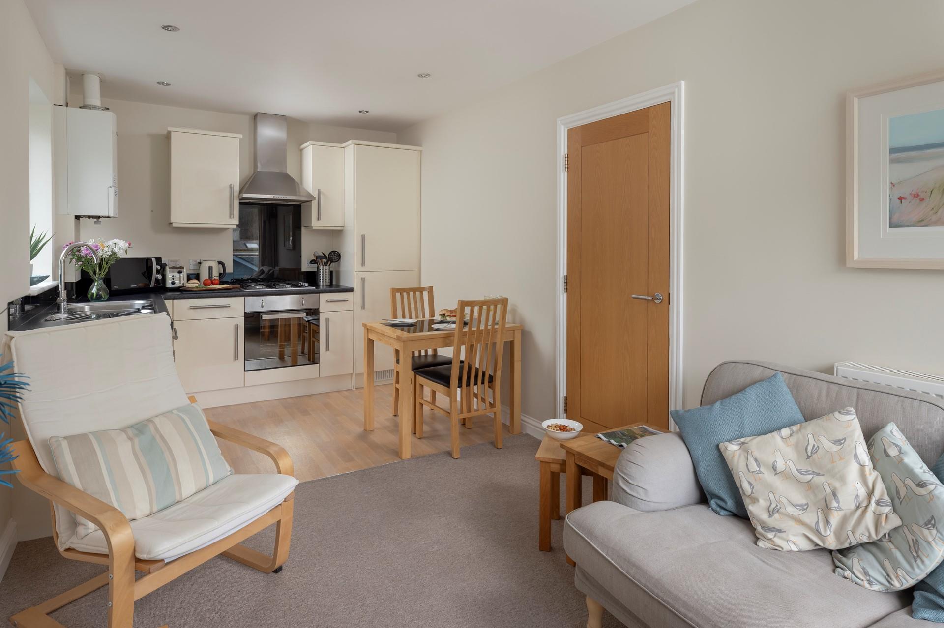 Open plan living has created a bright and uncluttered space, perfect for relaxing in.