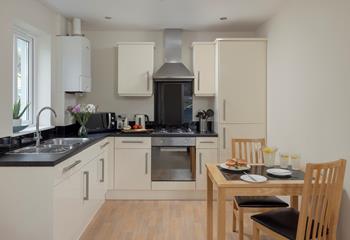 Cook up your favourite meals in this fully equipped kitchen!