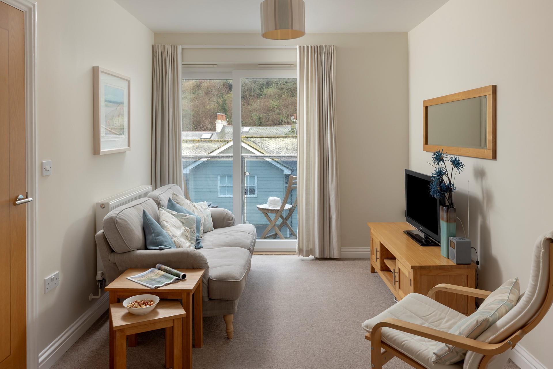 Relax in the plush and homely living area with a glass of something chilled whilst you watch the sunset over St Ives.