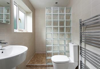We love the glass block wall in this spacious ensuite shower room. 