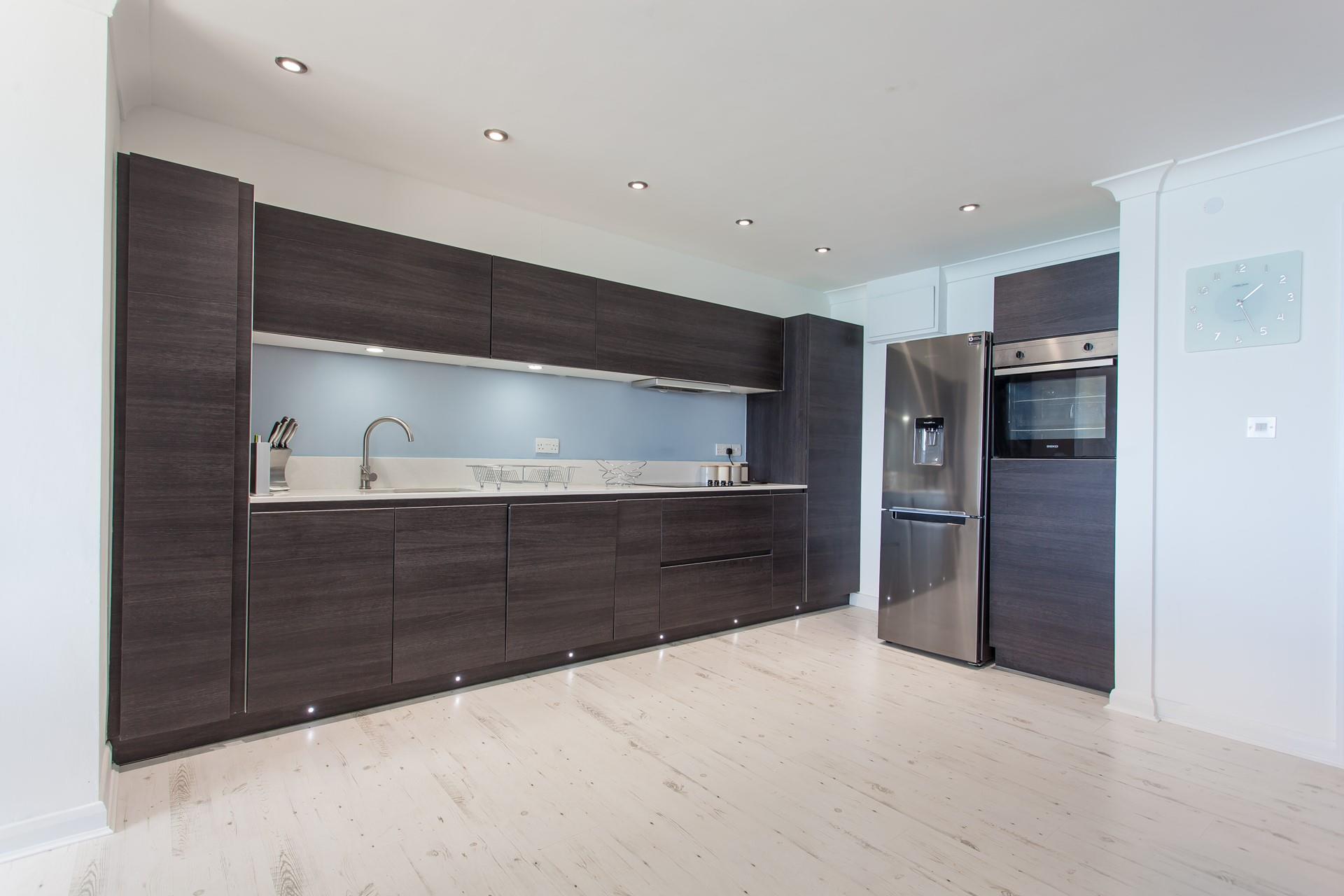 You'll enjoy cooking up a feast in the contemporary kitchen. 