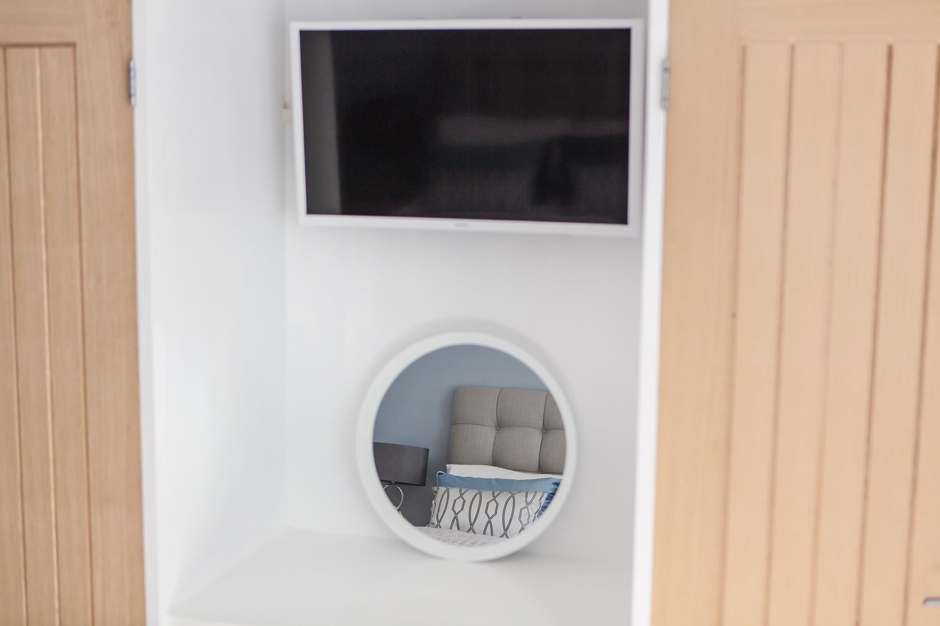 The king size room features a Smart TV with Netflix. 