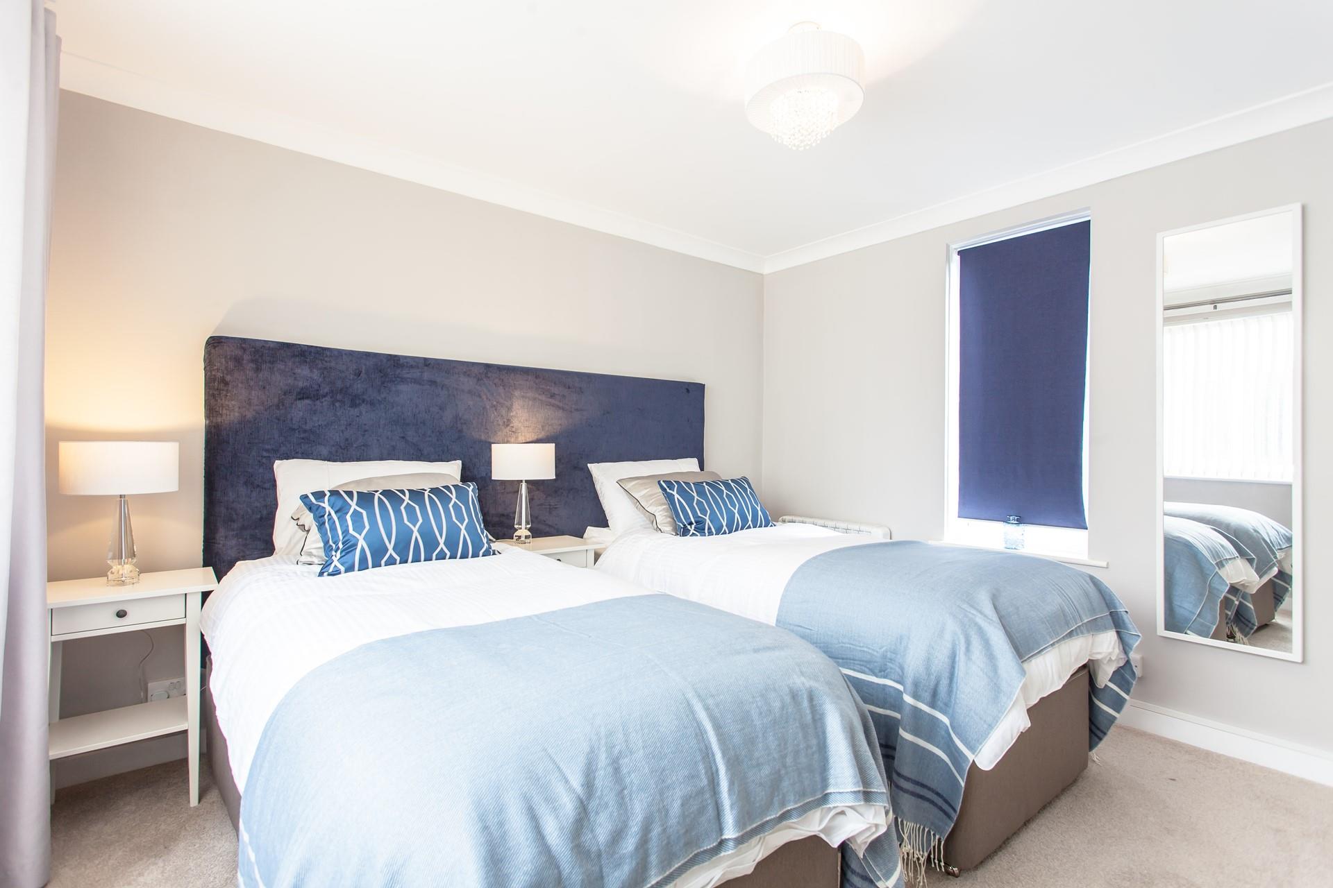 The sumptuous beds in the second bedroom can be made up as twins or converted into a super king size bed. 
