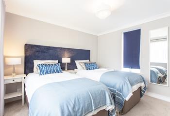 The sumptuous beds in the second bedroom can be made up as twins or converted into a super king size bed. 