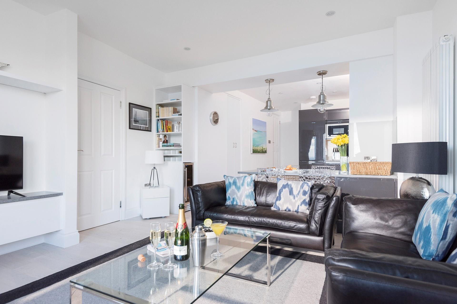Stylish and open plan, the living area is the perfect place for family get-togethers.