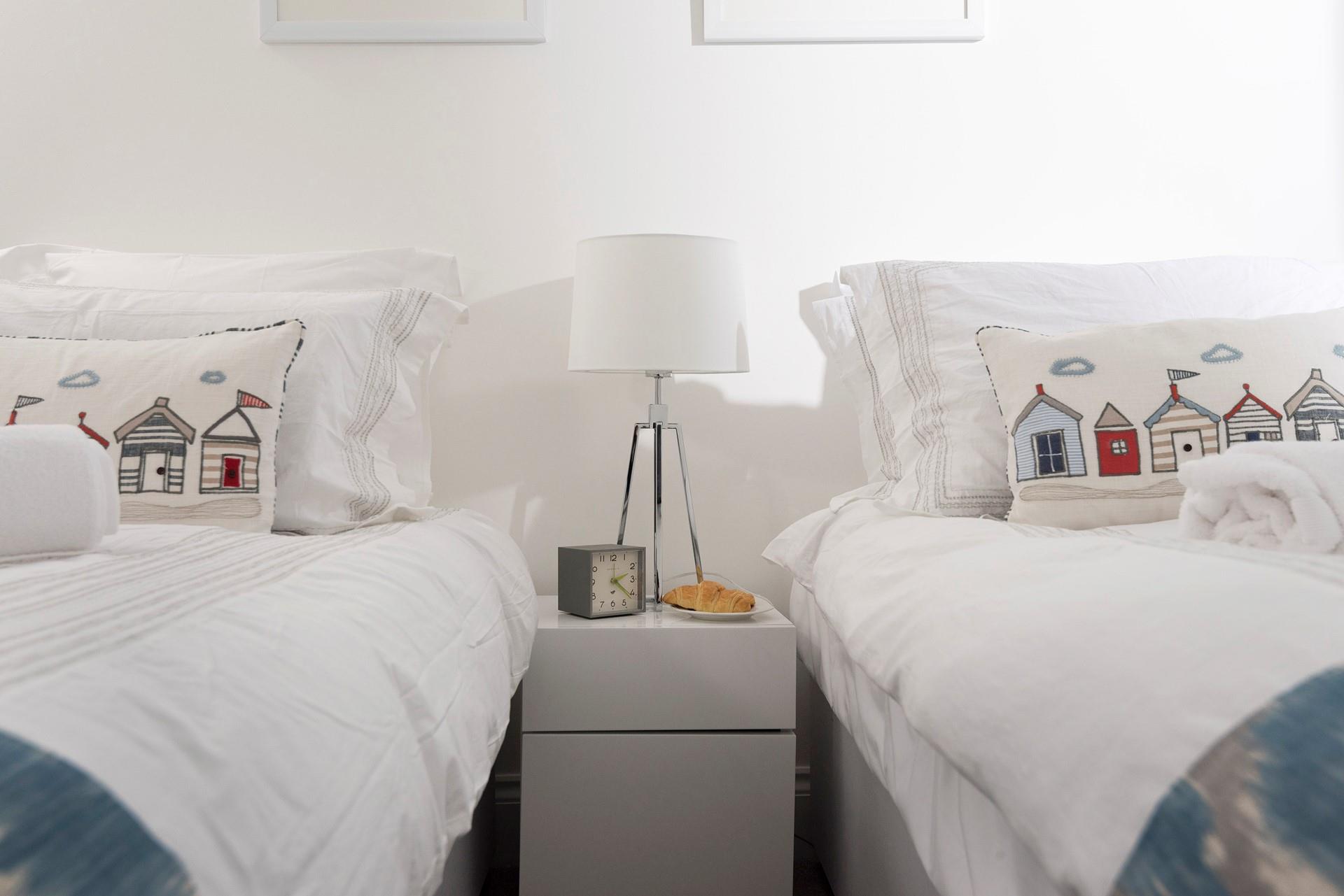 Zip and link beds can create a cosy twin or a king bedroom.