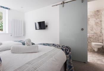Enjoy your own space with a stylish en suite in the second bedroom. 