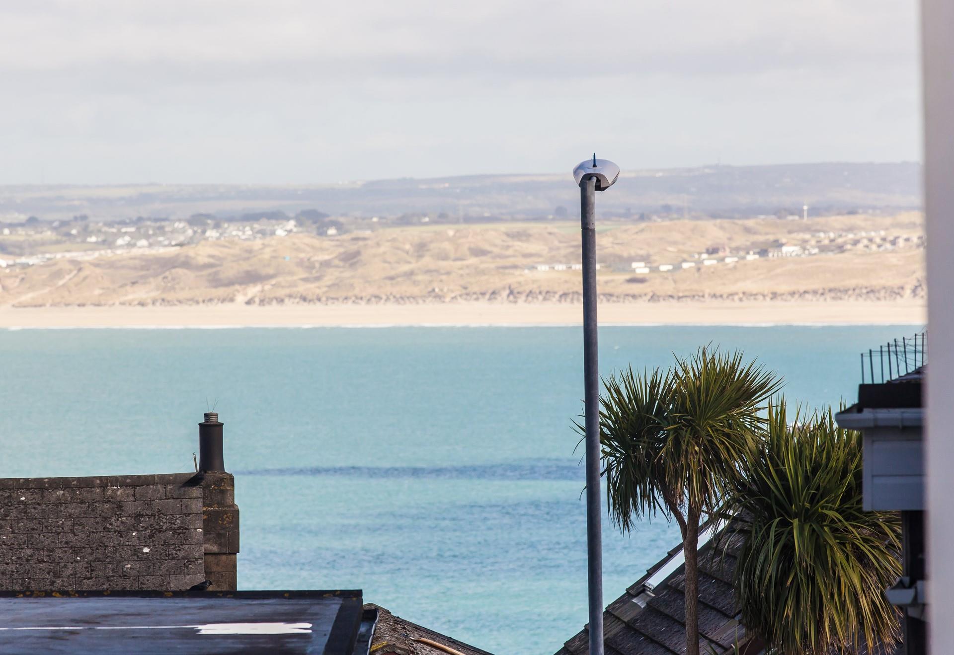 The waves in the distance will beckon you down to the beach!