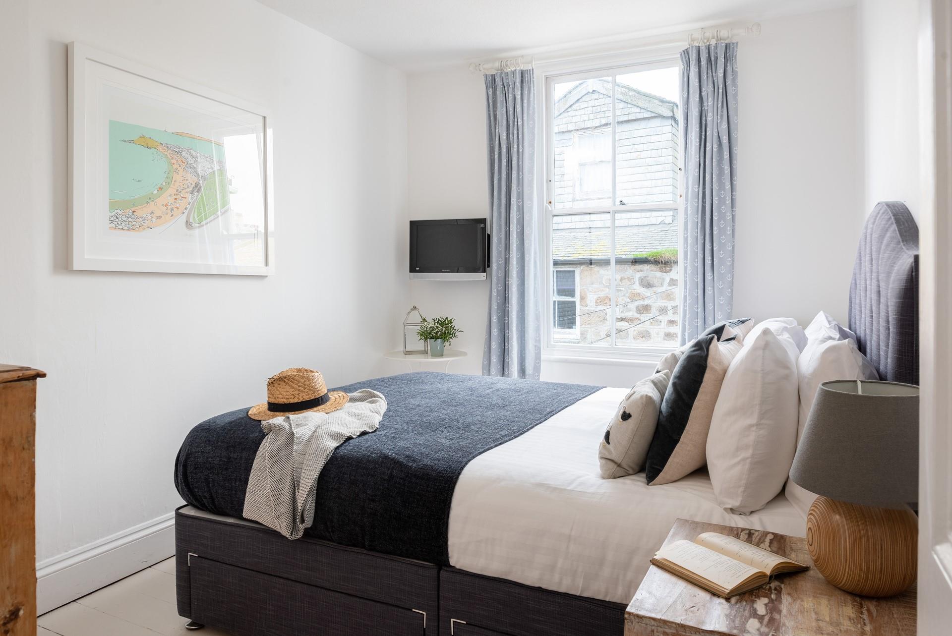 Bedroom 3 has a king size bed, perfect to sink into for a dreamy night's sleep.