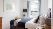 Bedroom 3 has a king size bed, perfect to sink into for a dreamy night's sleep.