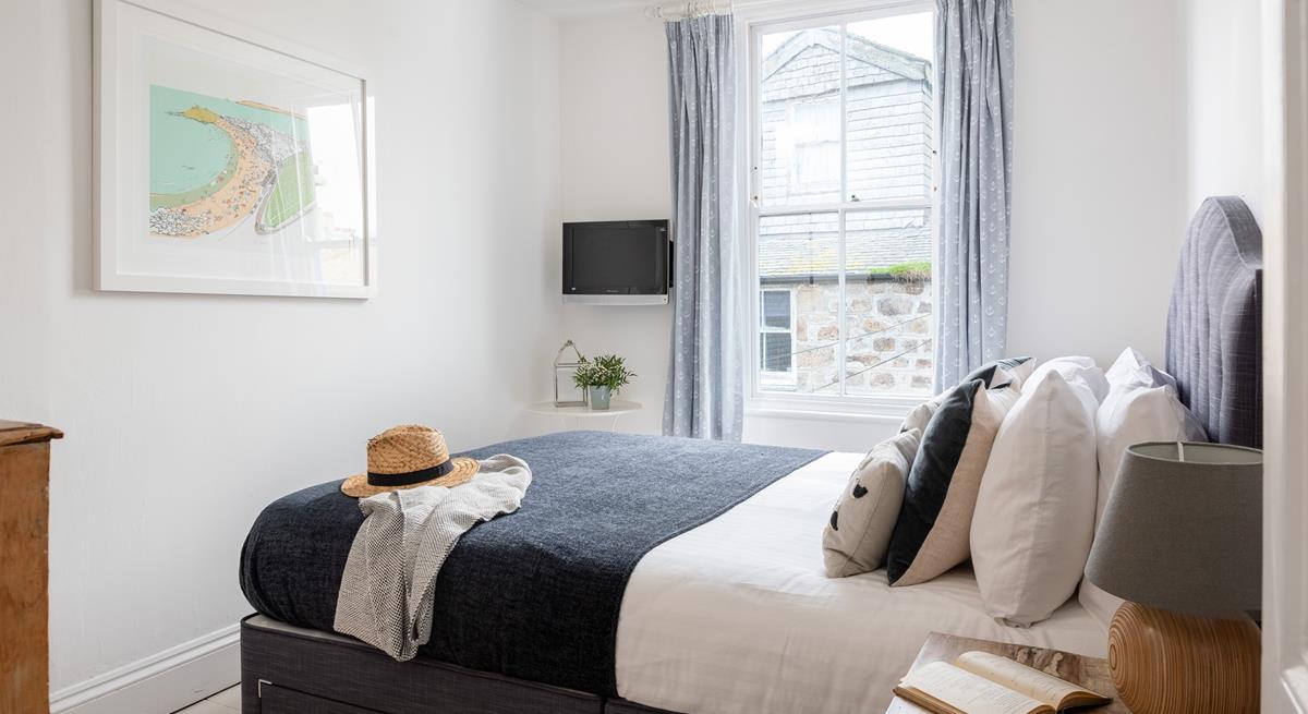 Bedroom 3 has a king size bed, perfect to sink into for a dreamy night's sleep.