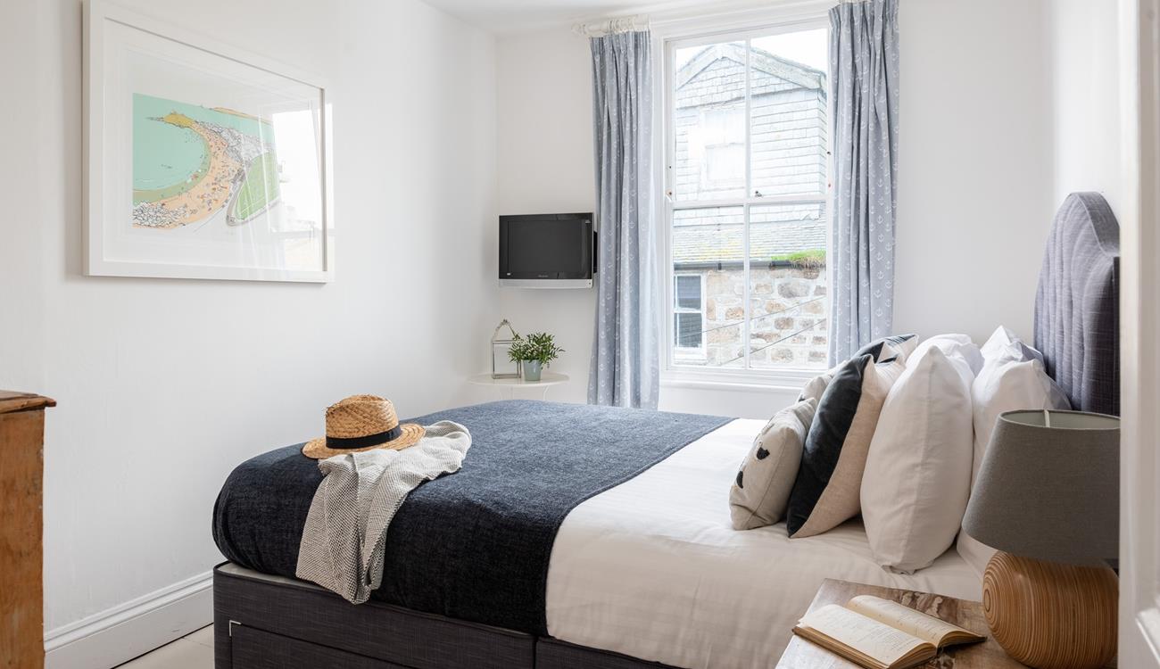 Bedroom 3 has a king size bed, perfect to sink into for a dreamy night's sleep.