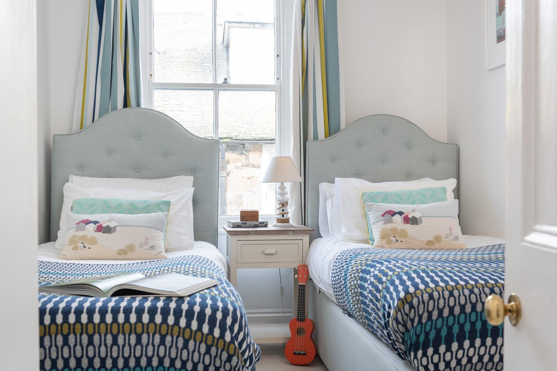 The twin beds are perfect for kids or adults to settle into.