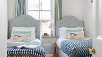 The twin beds are perfect for kids or adults to settle into.
