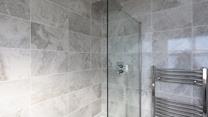 There is also a shower to wash off your sandy toes after a beach day.