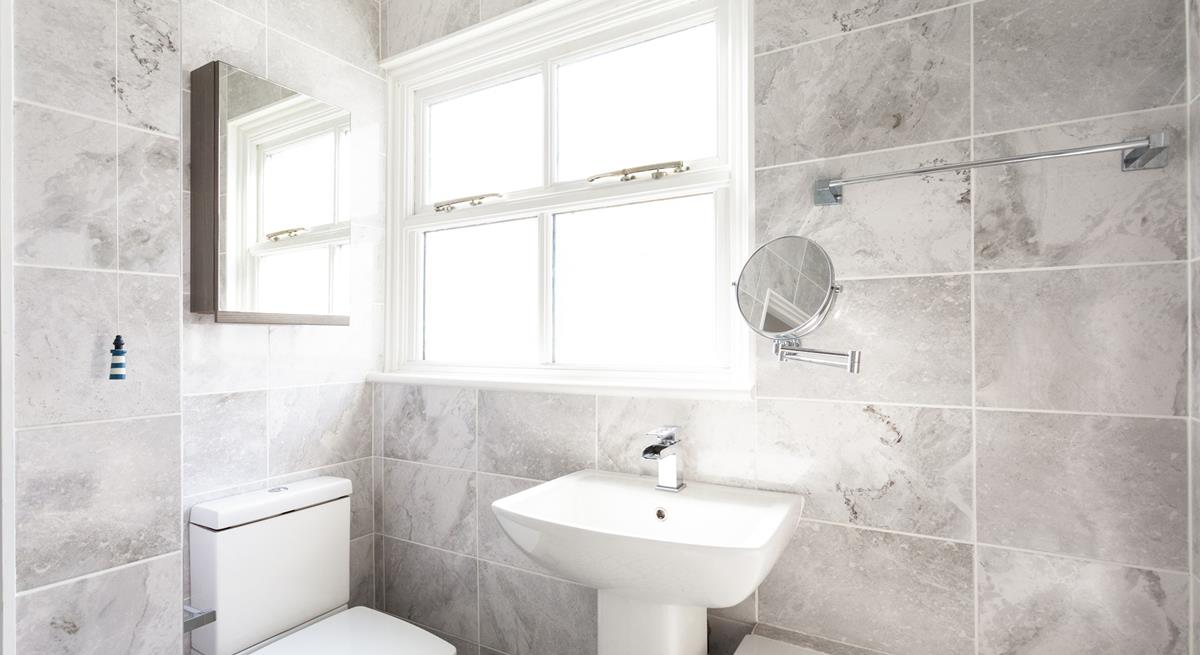 The family bathroom is the perfect space to get ready in the morning.