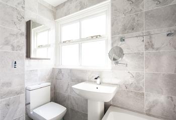 The family bathroom is the perfect space to get ready in the morning.