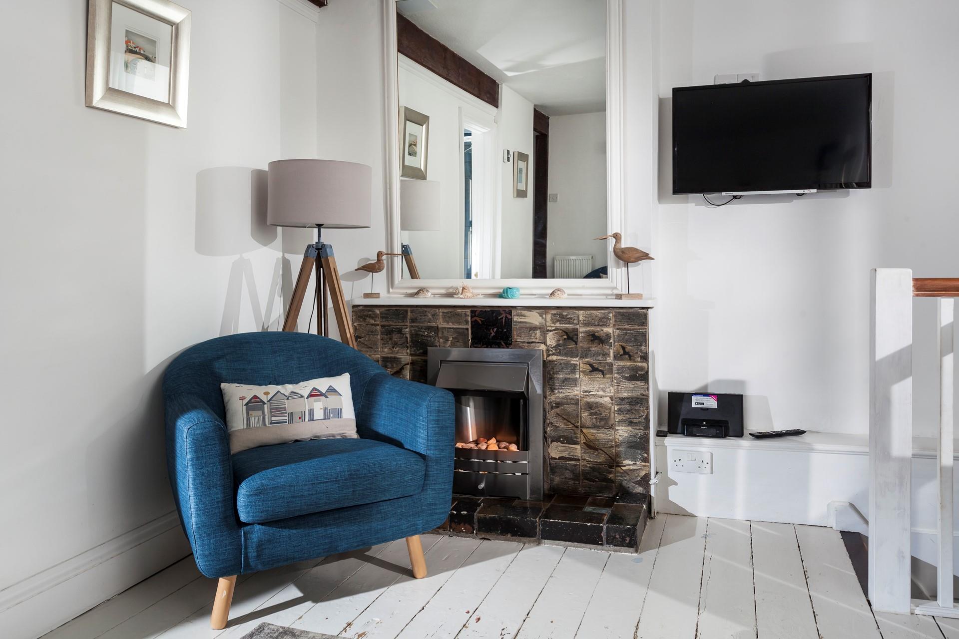 Put the fire on and snuggle up with something good on TV.