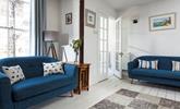 The blue and white interiors create a calming atmosphere in your cosy sitting room. - Thumbnail Image