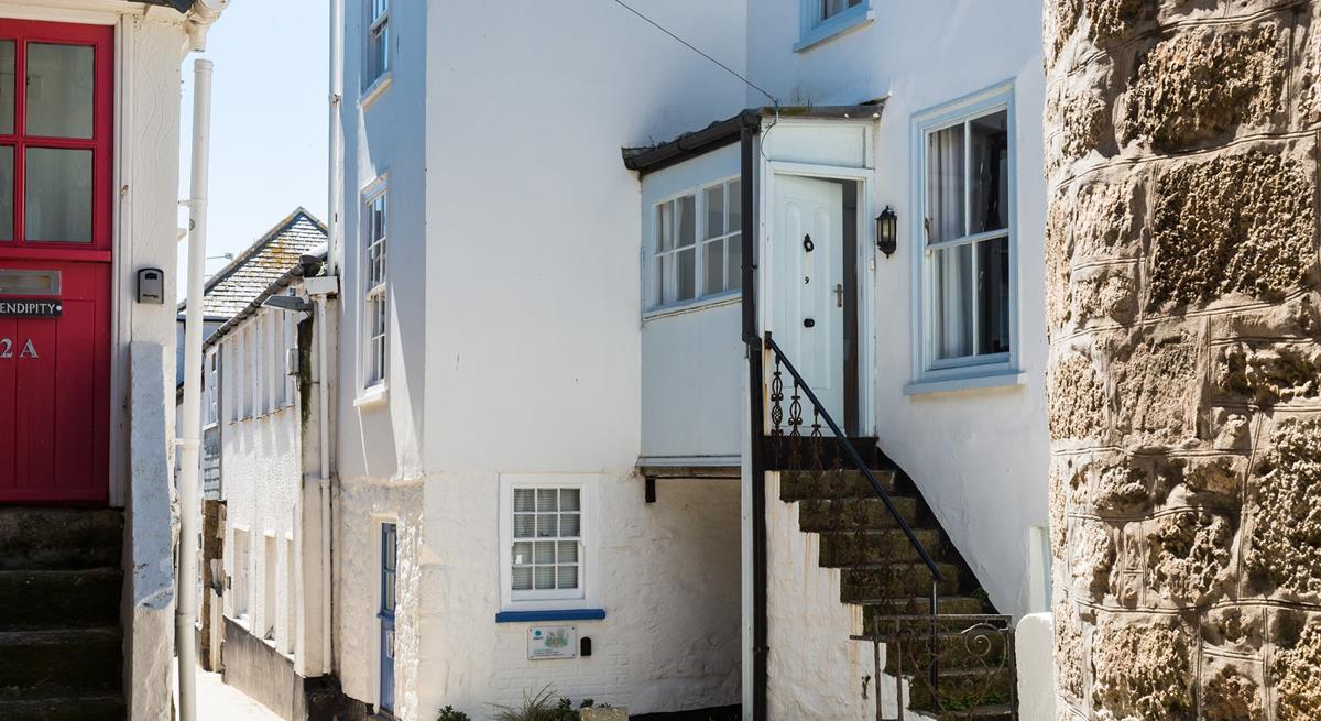 Granite steps lead up to the front door.
