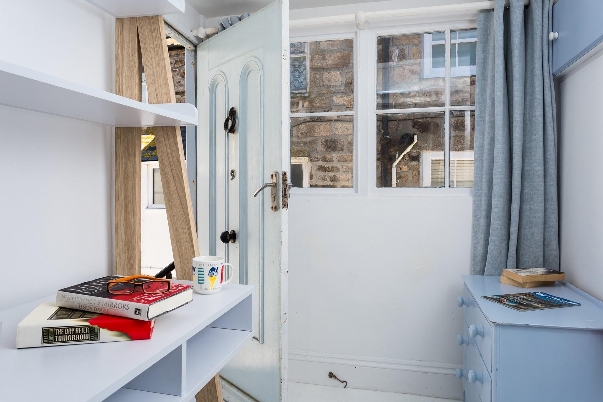 Porch area which opens onto the steps onto the Digey.