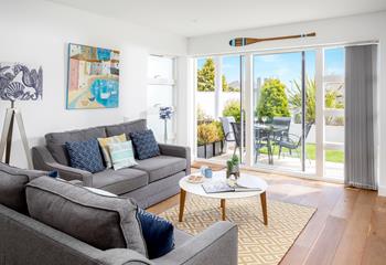 Open up the patio doors and relax in the sitting area, the fresh sea air drifting in. 