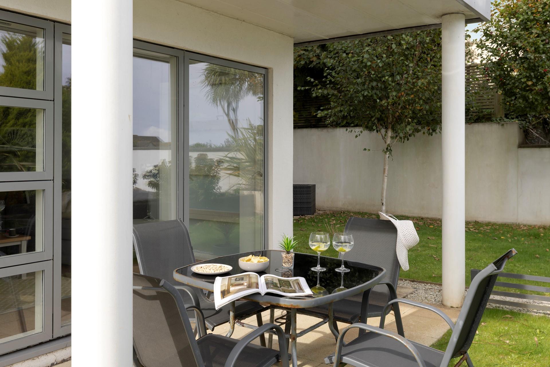 Sip a tipple on the patio as the sun goes down.