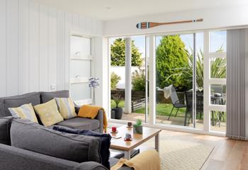 Open up the patio doors and relax in the sitting area, the fresh sea air drifting in. 