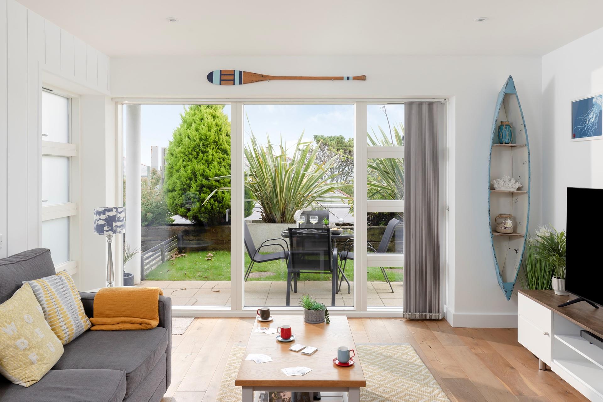 Open the patio doors to let the summer breeze through.