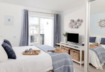 Open up the patio doors and enjoy a lazy morning in bed, fresh air drifting into the room. 