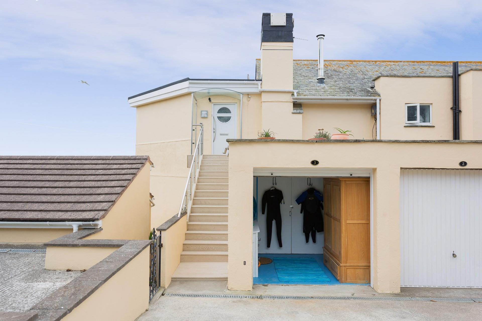 There is convenient wetsuit storage in the garage.