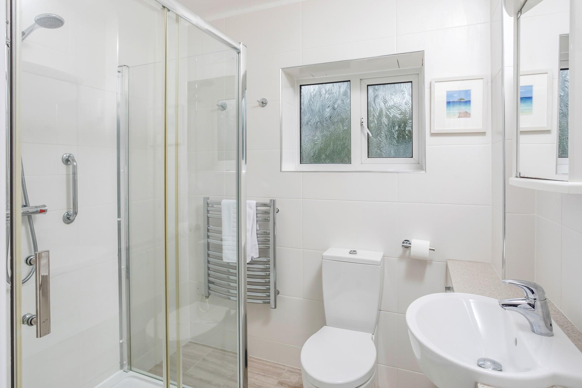 Spend the day on Praa Sands beach and come back to wash off sandy toes before relaxing in front of the woodburner.