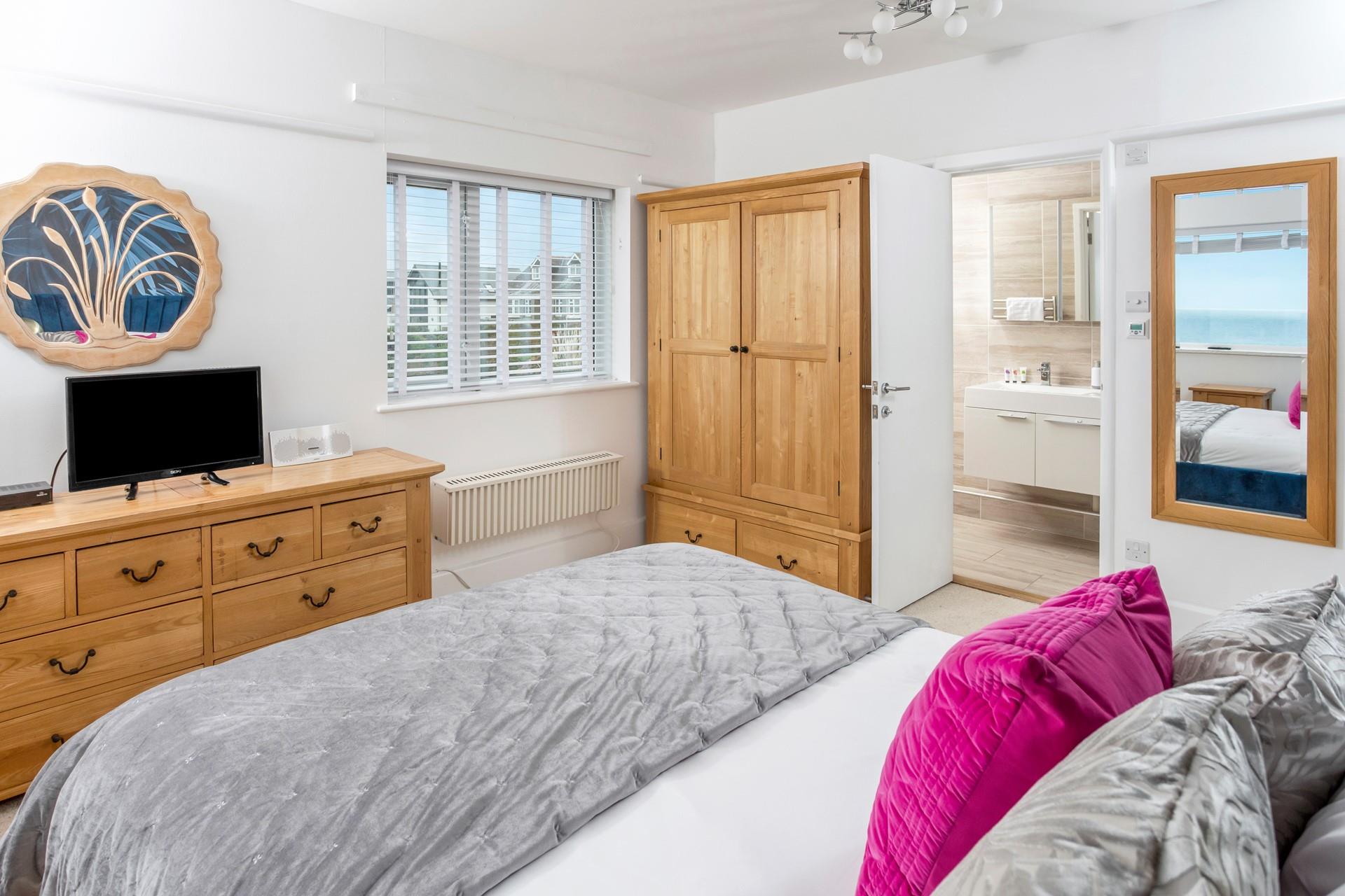 There is plenty of wardrobe space for holiday clothes.