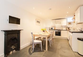 The open plan kitchen diner means you can still entertain whilst cooking hearty meals.