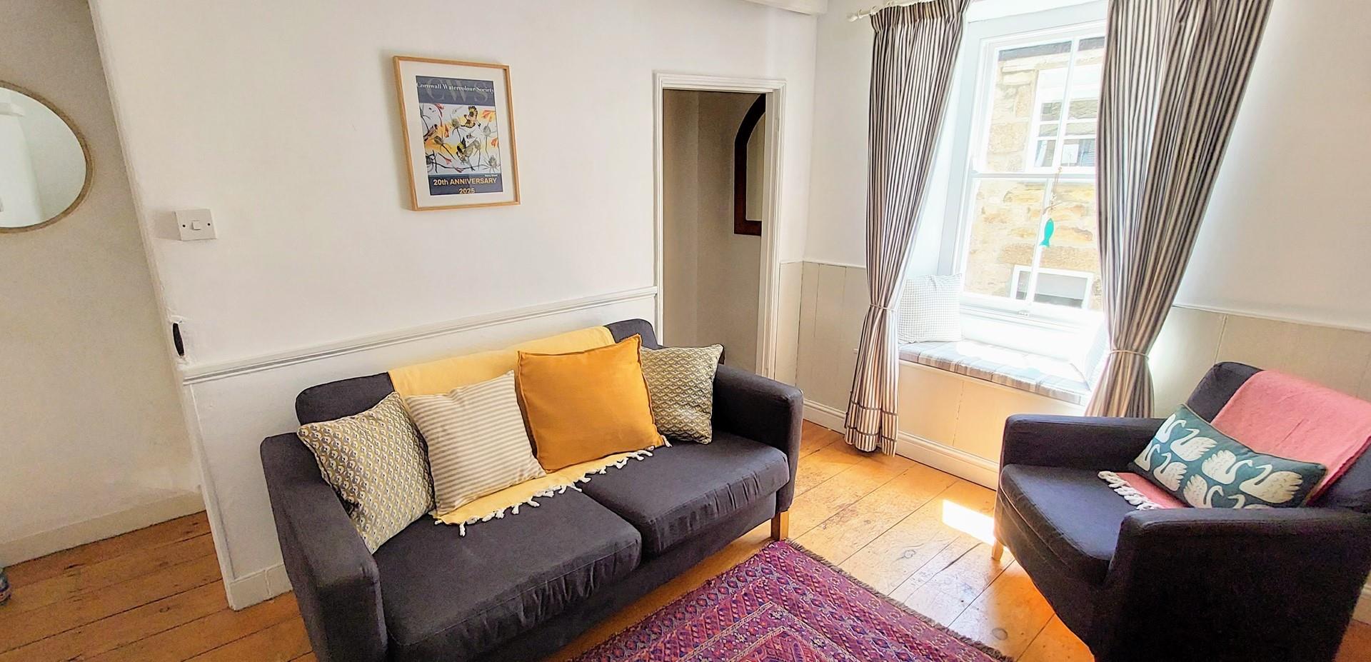 Unwind with a good book in the quaint window seat.