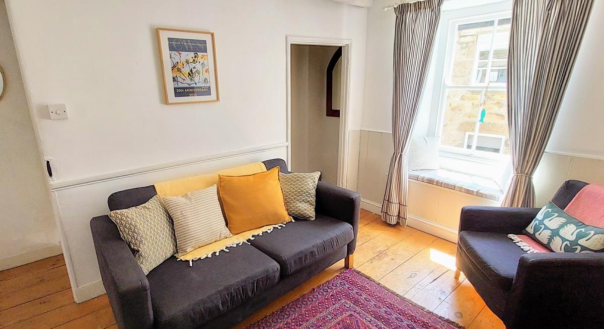 Unwind with a good book in the quaint window seat.