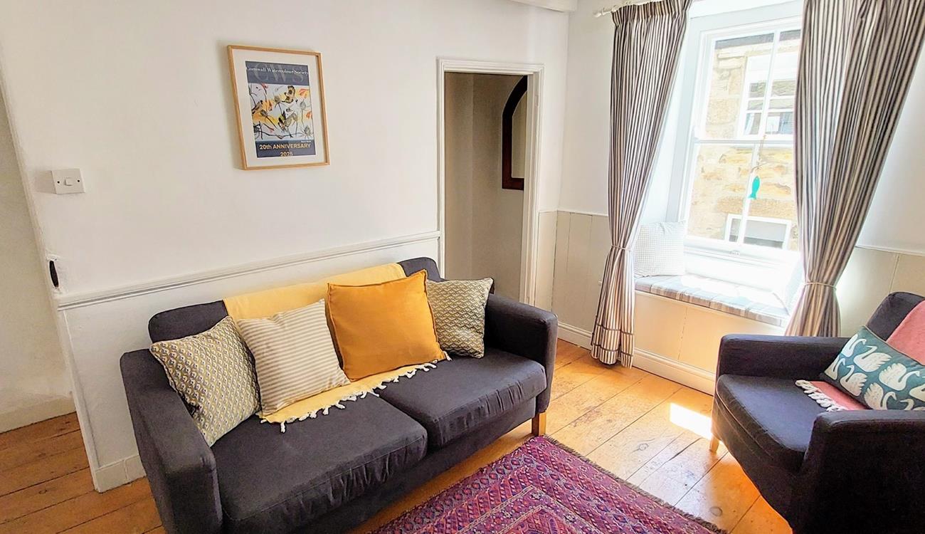 Unwind with a good book in the quaint window seat.