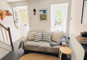 Coastal colours feature in this seaside cottage.