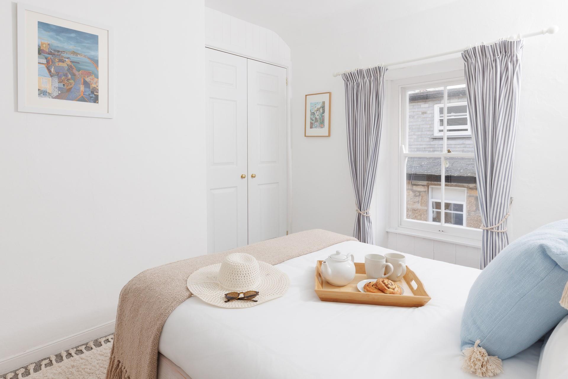 There's plenty of storage for a holiday suitcase.