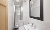 A handy shower rooms make it easy to rinse off after a day on the beach. - Thumbnail Image