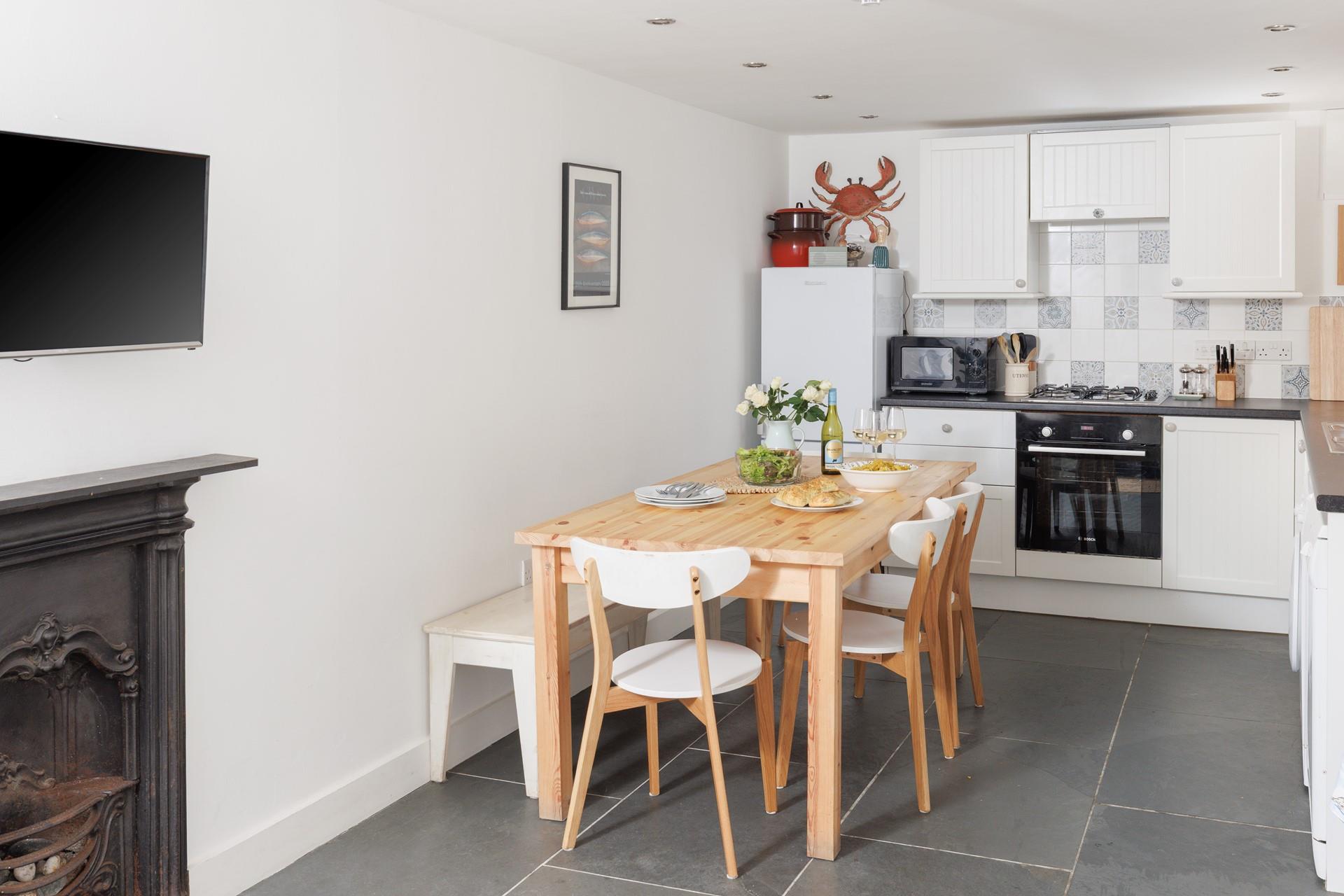 The modern kitchen is equipped with all the amenities you need.