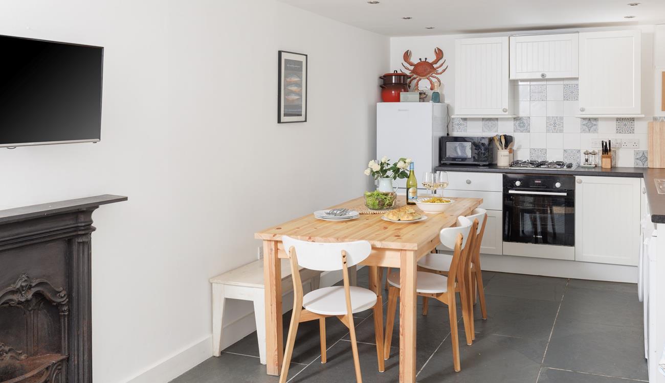 The modern kitchen is equipped with all the amenities you need.