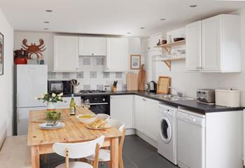 Cook up a storm in the well-equipped kitchen!