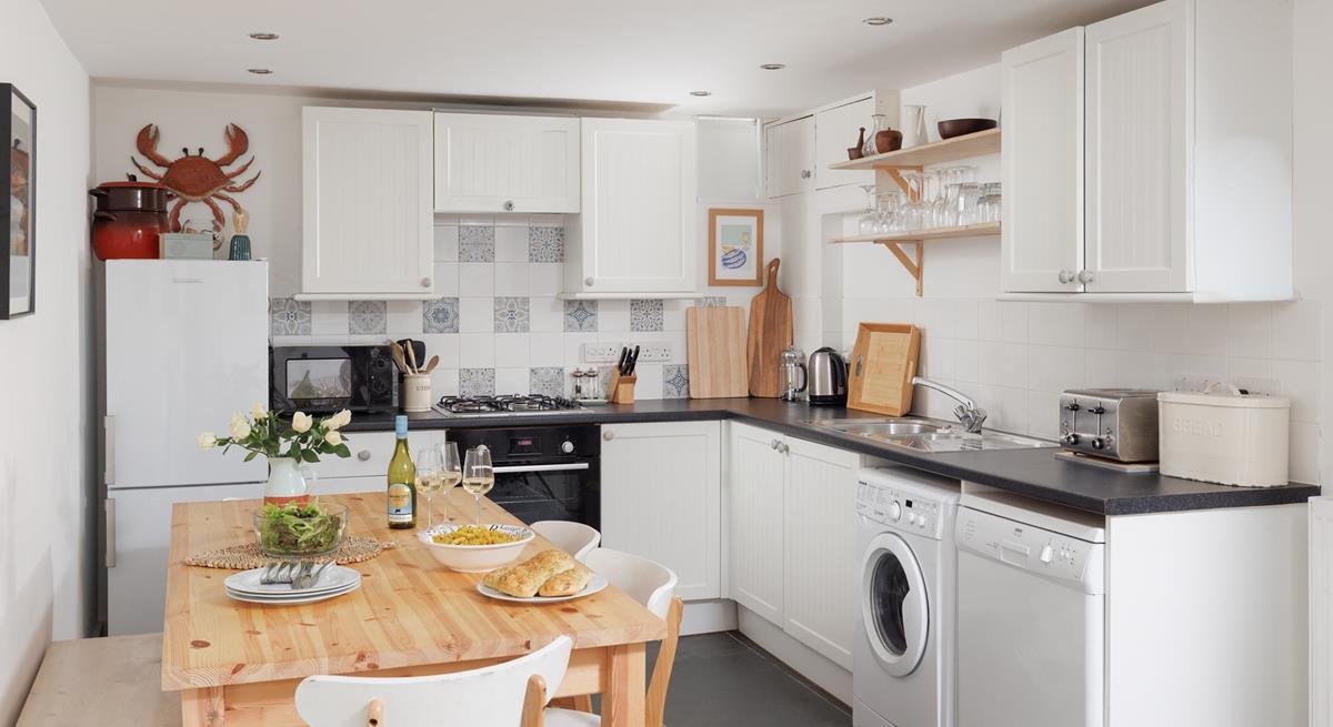 Cook up a storm in the well-equipped kitchen!