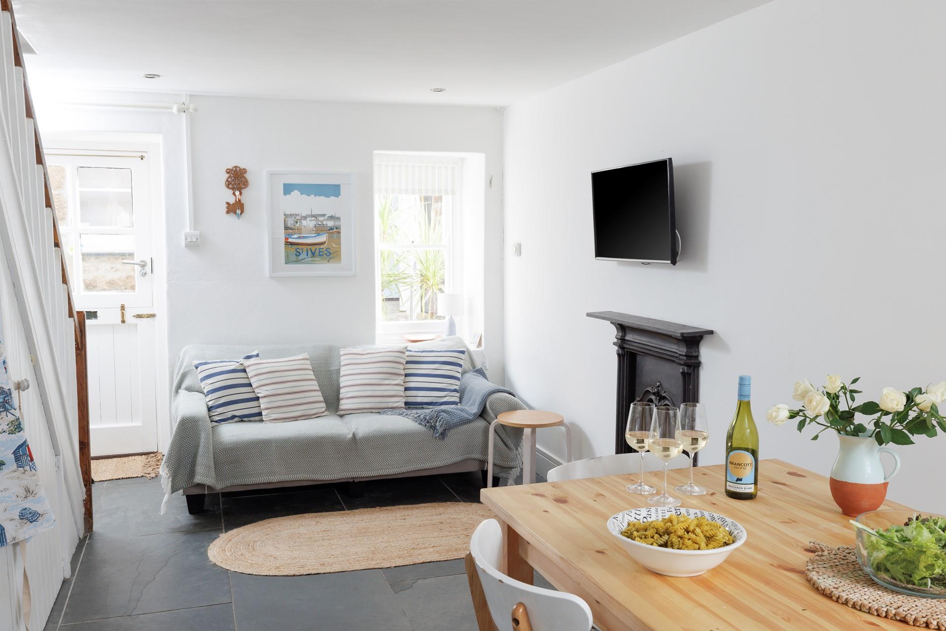 Coastal colours feature in this seaside cottage.