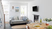 Coastal colours feature in this seaside cottage.