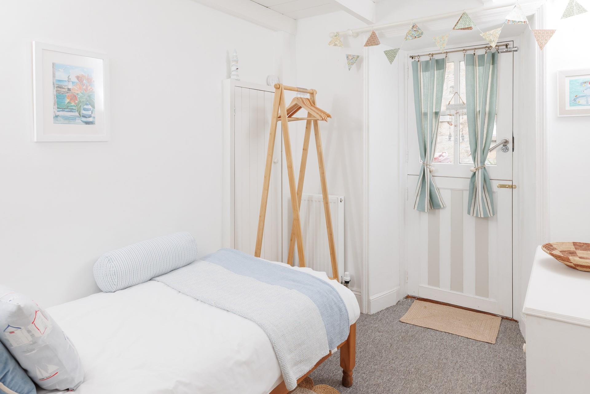 The single bedroom is ideal for an adult or child.