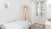 The single bedroom is ideal for an adult or child.