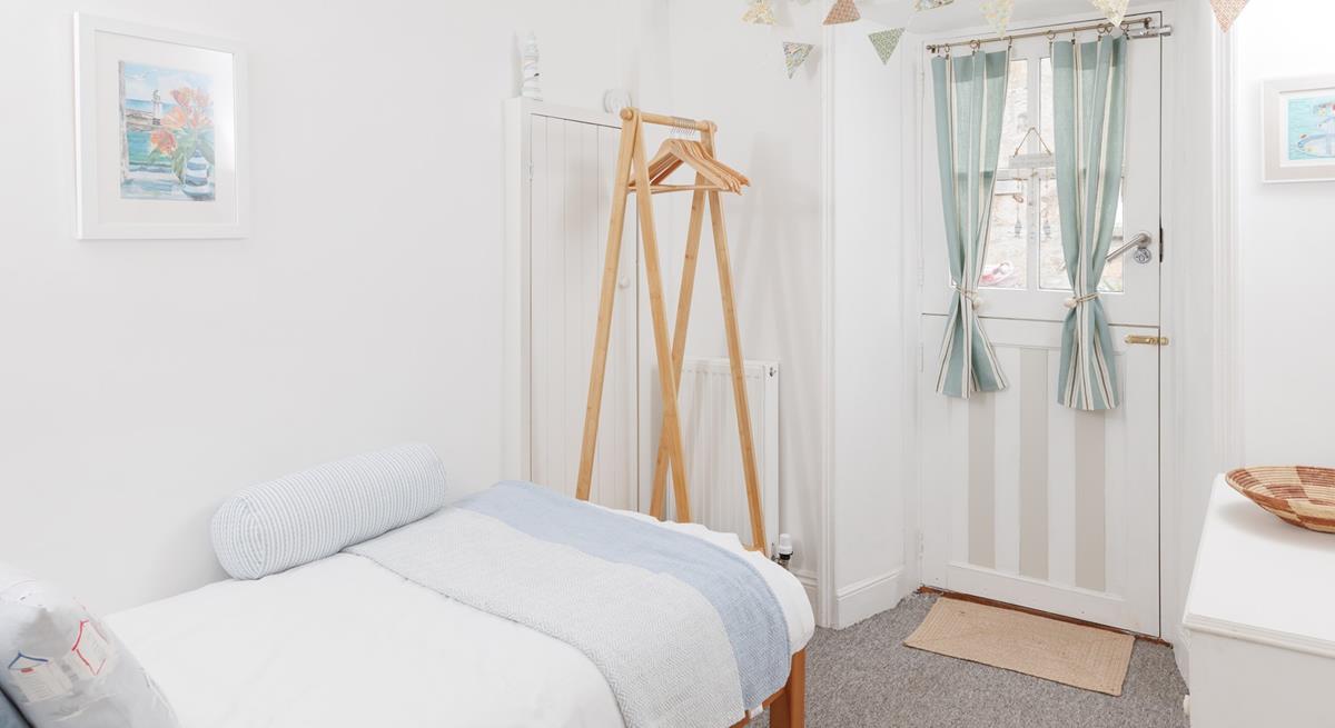 The single bedroom is ideal for an adult or child.